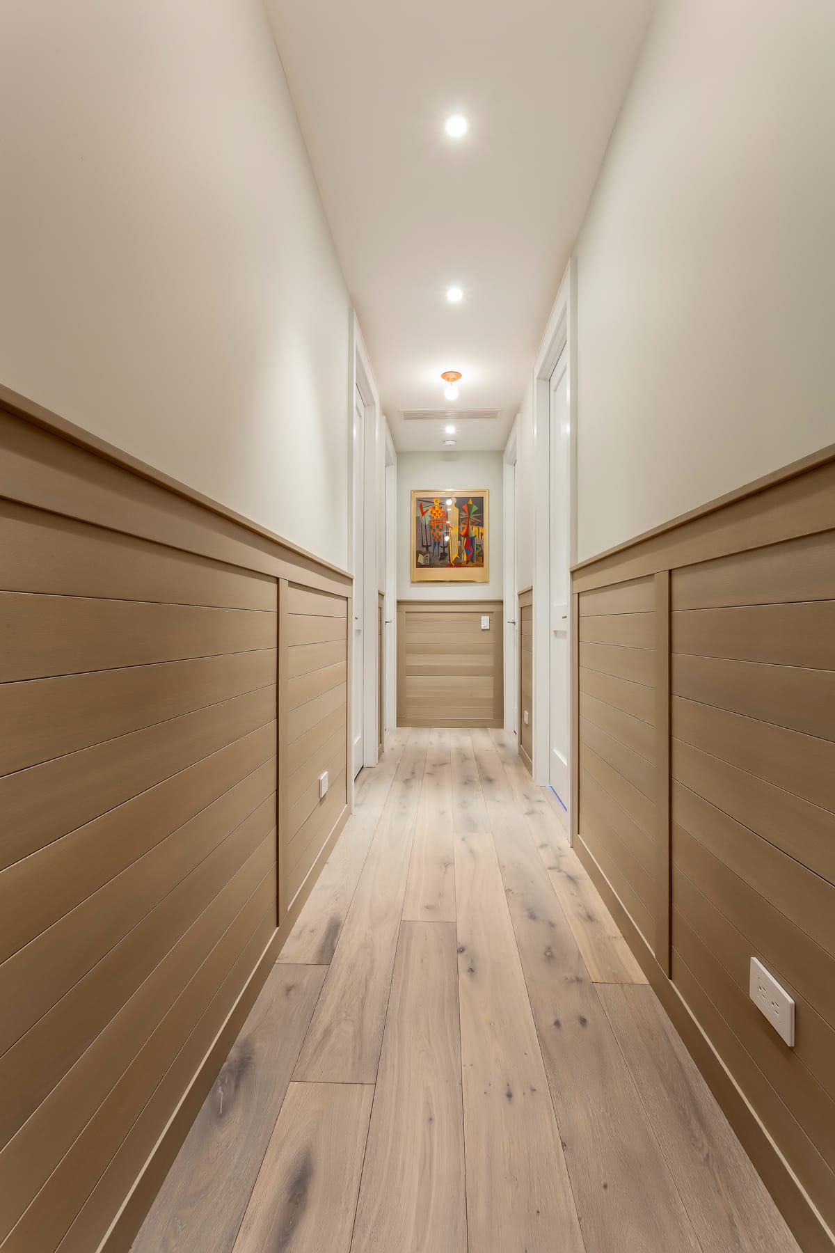 hallway with wainscot
