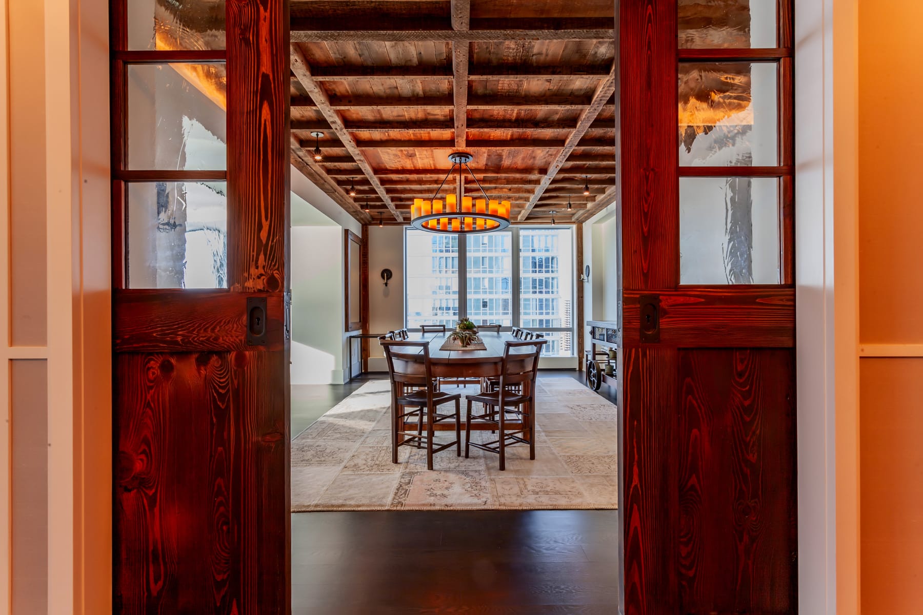 living room with a reclaimed wood ceiling